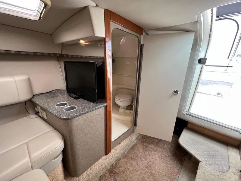 Slide: The Image of Interior cabin of a 2005 Formula 330 Sun Sport boat with TV and bathroom. - 23