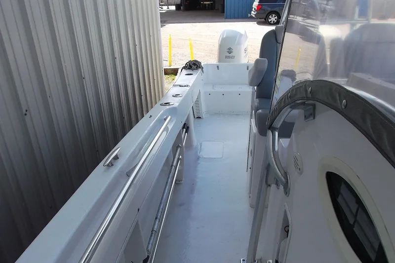 Slide: The Image of 2018 Twin Vee 260 CC SE boat interior, featuring sleek design and spacious layout. - 14