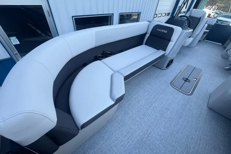 Slide: The Image of Luxurious seating on 2026 Harris Cruiser 230 CWDH pontoon boat, featuring sleek design and comfort. - 15