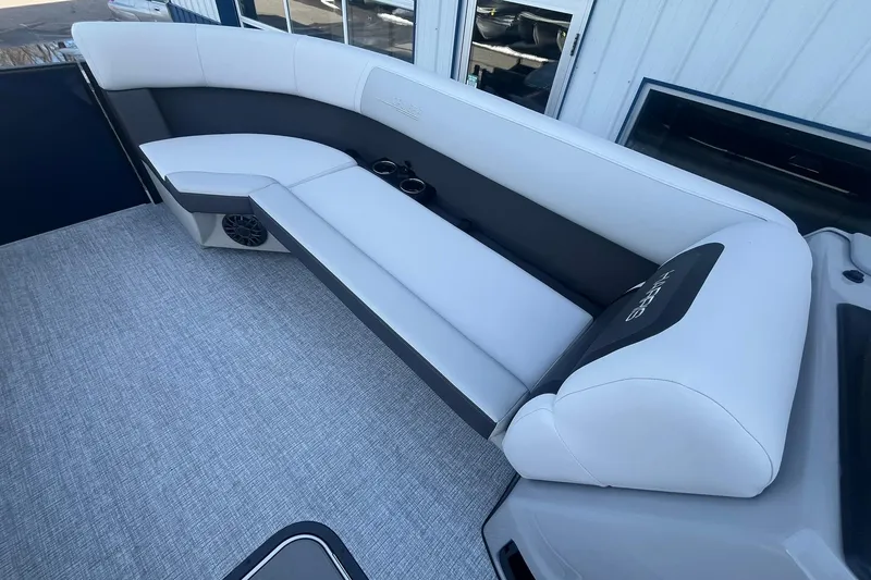 Slide: The Image of 2026 Harris Cruiser 230 CWDH boat interior with sleek seating and modern design. - 25