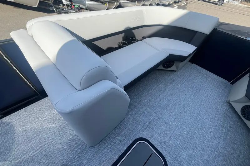 Slide: The Image of 2026 Harris Cruiser 230 CWDH boat interior with plush seating and modern design. - 26