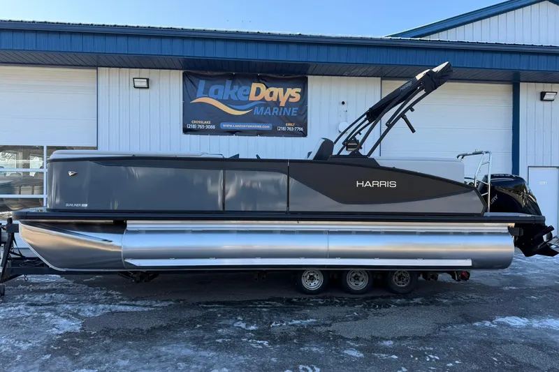 The Image of 2026 Harris Sunliner 230 pontoon boat displayed at Lake Days Marine dealership. - 12