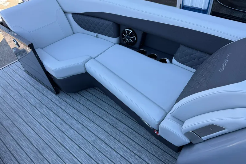 Slide: The Image of Luxurious seating on 2026 Harris Sunliner 230 boat with sleek design and cup holders. - 25