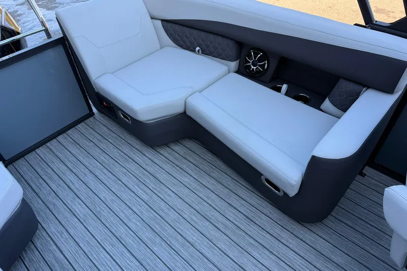 Slide: The Image of Luxurious seating on 2026 Harris Sunliner 230 boat with stylish upholstery and modern design. - 29