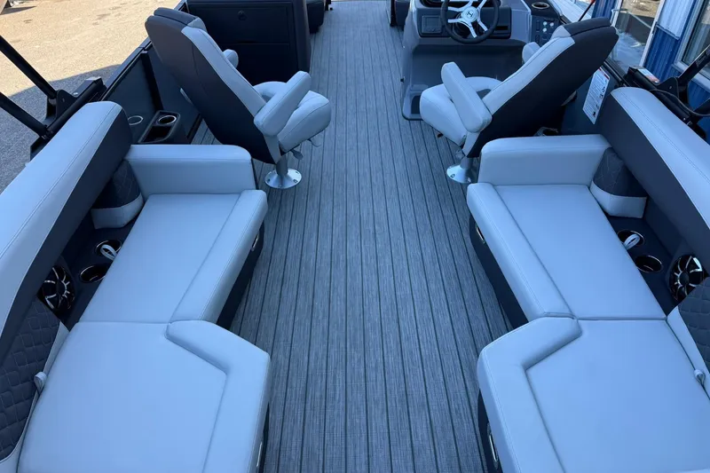 Slide: The Image of Luxurious interior of 2026 Harris Sunliner 230 pontoon boat with plush seating and modern design. - 30