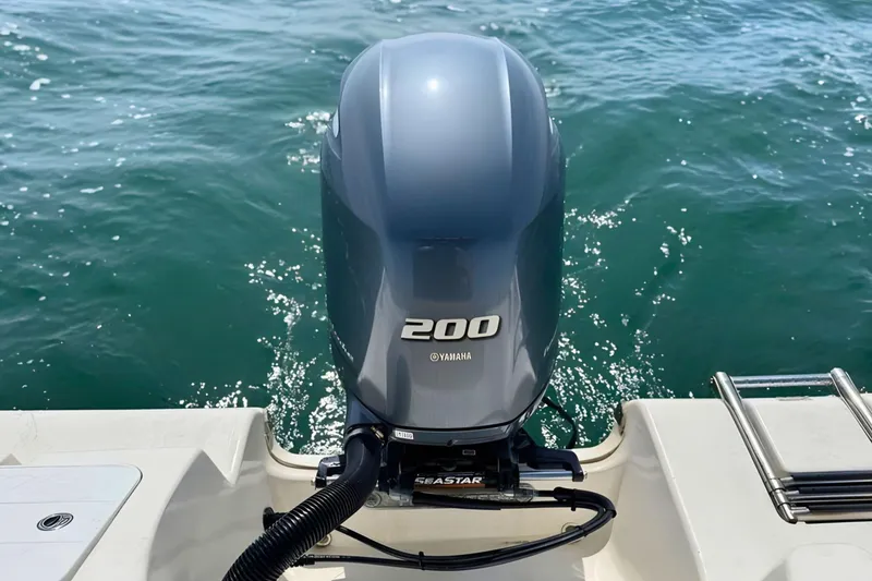 Slide: The Image of Yamaha 200 outboard motor on 2019 Tidewater 220 LXF boat, ocean background. - 16