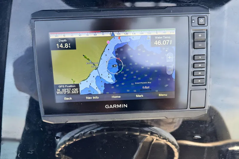 Slide: The Image of Garmin GPS display on 2019 Tidewater 220 LXF showing depth and water temperature. - 22