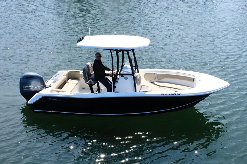 Slide: The Image of 2019 Tidewater 220 LXF boat with Yamaha engine on calm water. - 3