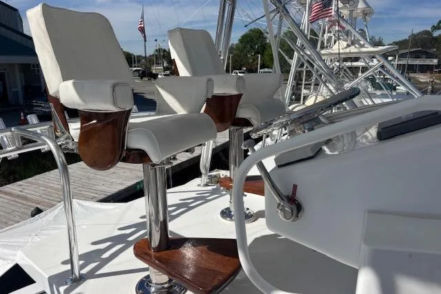 Slide: The Image of Luxury helm chairs on a 2006 Hatteras 50 Convertible yacht deck. - 10
