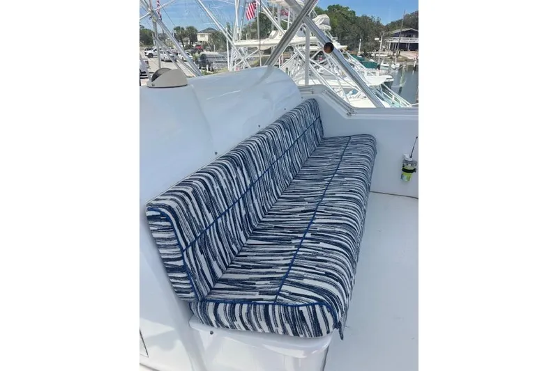 Slide: The Image of Blue-striped seating on 2006 Hatteras 50 Convertible yacht deck. - 13