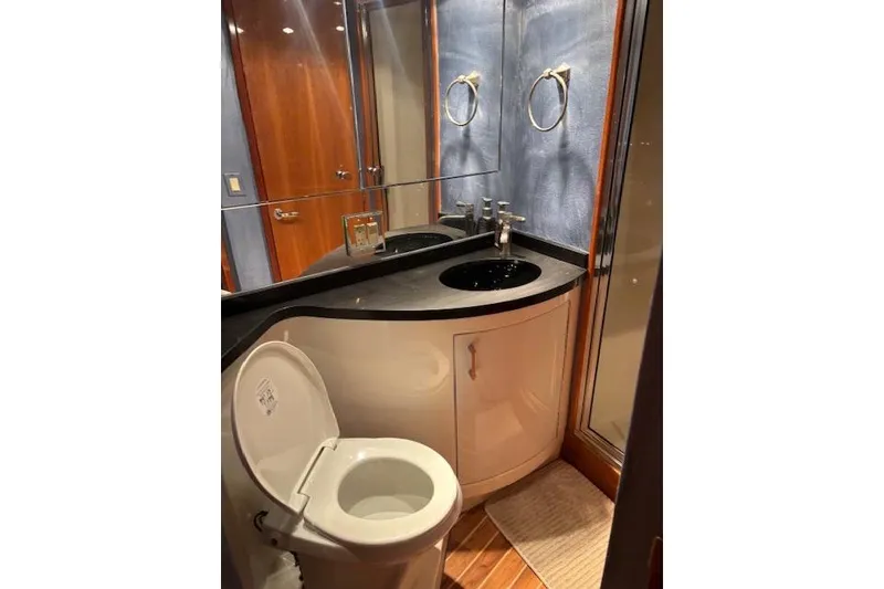 Slide: The Image of Bathroom interior of 2006 Hatteras 50 Convertible yacht with modern fixtures. - 27
