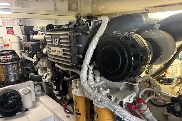 Slide: The Image of Engine room of 2006 Hatteras 50 Convertible yacht with CAT marine power engine. - 30