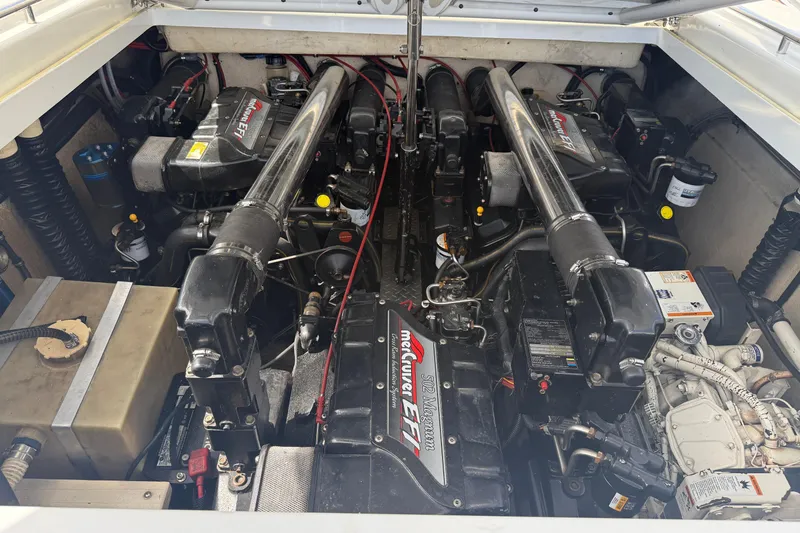 Slide: The Image of Engine compartment of a 1994 Formula 419 SR-1 boat with twin MerCruiser engines. - 14