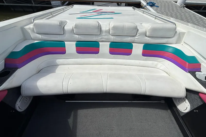 Slide: The Image of 1994 Formula 419 SR-1 boat interior with colorful seating and modern design. - 29