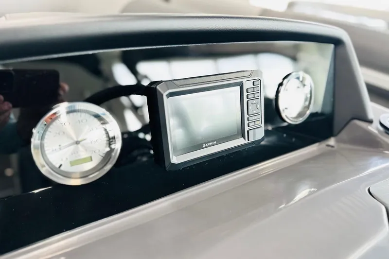 Slide: The Image of Dashboard of 2026 Bennington 22 SSR with Garmin display and gauges. - 3