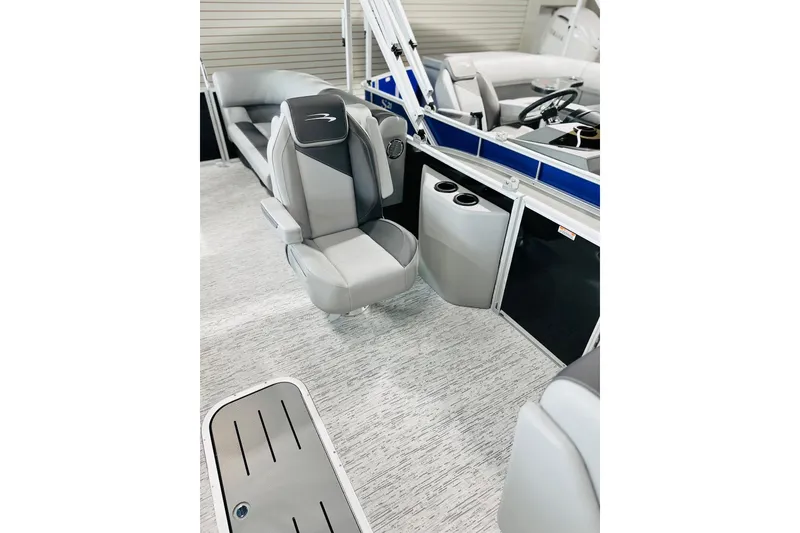 Slide: The Image of 2026 Bennington 22 SSR boat interior with gray seating and modern design. - 6