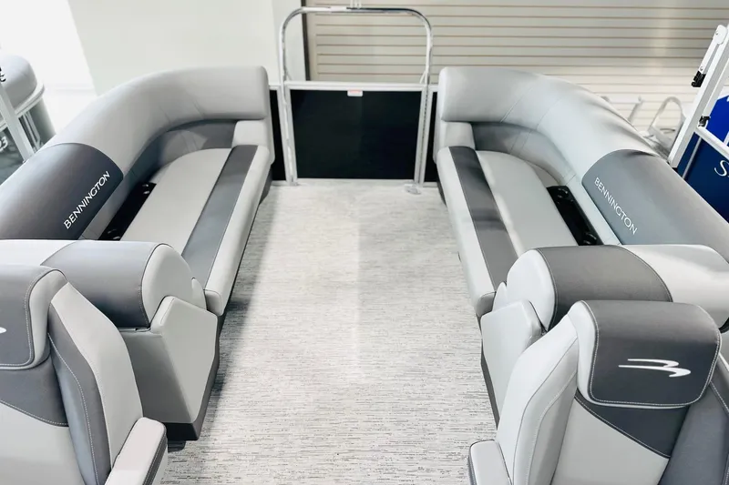 Slide: The Image of 2026 Bennington 22 SSR pontoon boat interior with luxurious gray seating. - 8