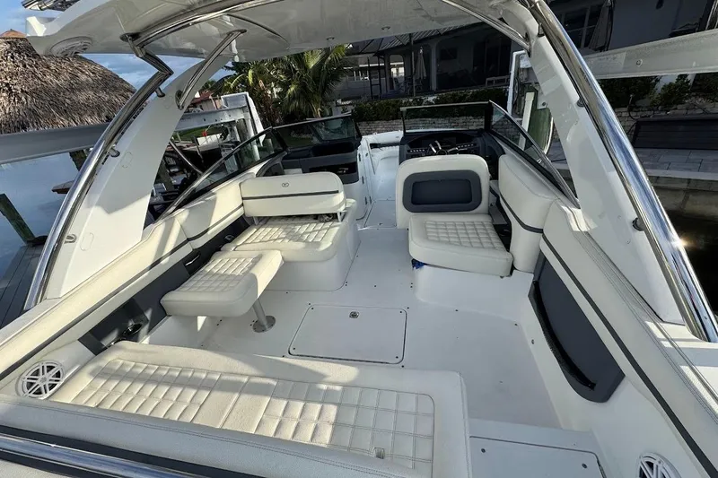 Slide: The Image of 2018 Cobalt 30SC boat interior with white seating and modern design. - 15
