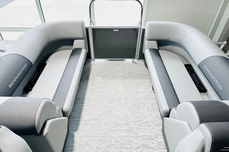 Slide: The Image of 2026 Bennington 23 SSR boat interior with sleek gray seating and modern design. - 8
