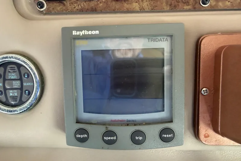 Slide: The Image of Raytheon Tridata display on 2000 Sea Ray Sundancer 310 boat dashboard. - 9