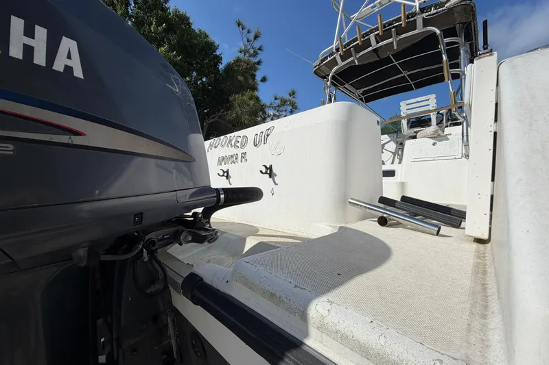 Slide: The Image of Century 3200 Walk-Around boat, 2000 model, featuring Yamaha engine and fishing setup. - 19