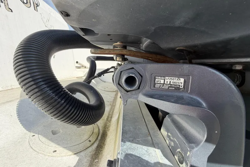 Slide: The Image of Close-up of Yamaha LF250TXR engine part on 2000 Century 3200 Walk-Around boat. - 28