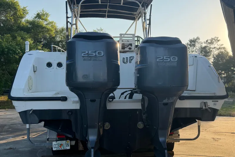 Slide: The Image of 2000 Century 3200 Walk-Around boat with dual 250 horsepower outboard engines. - 5