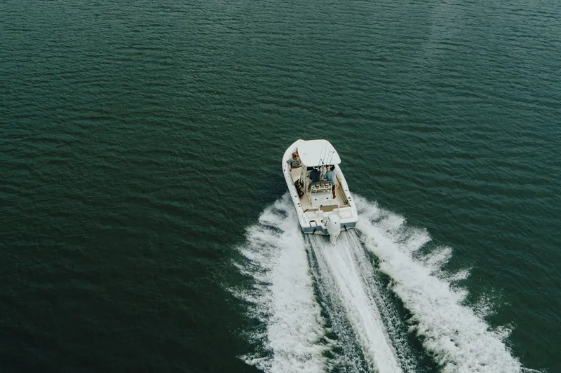 Slide: The Image of Aerial view of 2026 Key West 239 FS boat cruising on open water. - 6