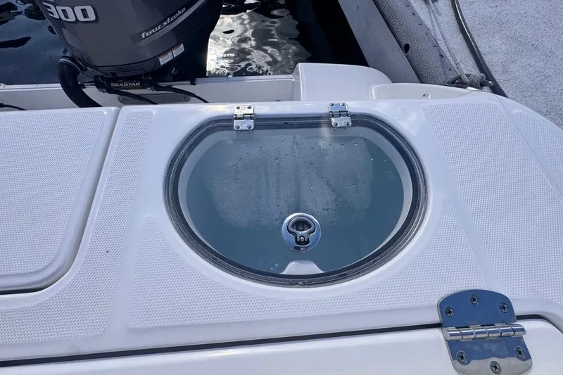 Slide: The Image of 2020 Robalo R242 Explorer boat with livewell and Yamaha 300 outboard engine. - 18