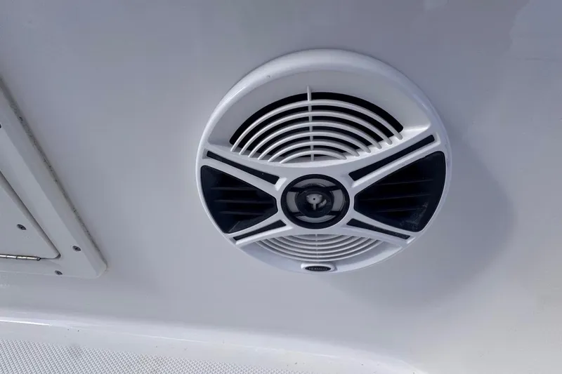 Slide: The Image of Close-up of a speaker on a 2020 Robalo R242 Explorer boat. - 42
