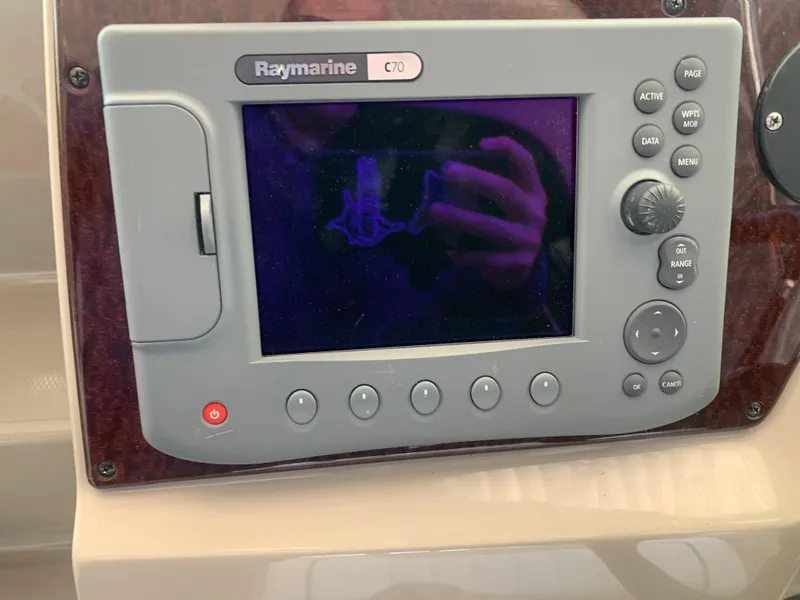 Slide: The Image of Raymarine C70 navigation system on 2009 Sea Ray 270 Sundancer boat dashboard. - 8