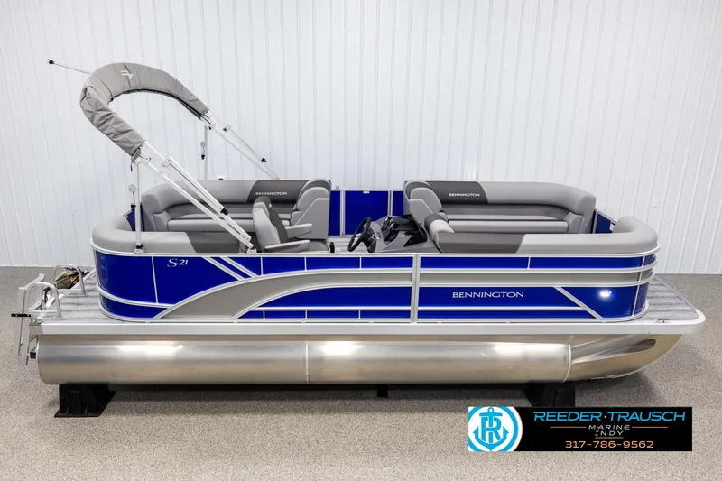The Image of 2025 Bennington 21 SSR pontoon boat with blue trim and gray seating. - 1