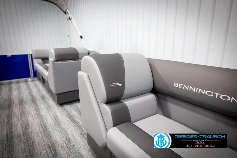Slide: The Image of Interior of 2025 Bennington 21 SSR with gray seating. - 21