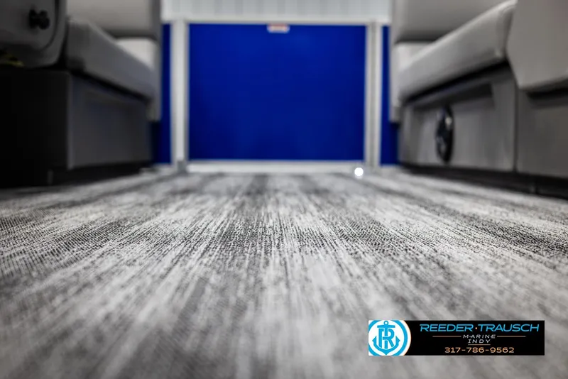 Slide: The Image of Interior of 2025 Bennington 21 SSR with modern carpet flooring. - 39
