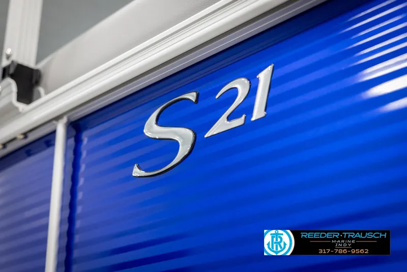 Slide: The Image of Close-up of Bennington 21 SSR 2025 boat, blue design. - 43