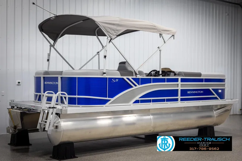 Slide: The Image of Bennington 21 SSR 2025 pontoon boat in a showroom. - 6