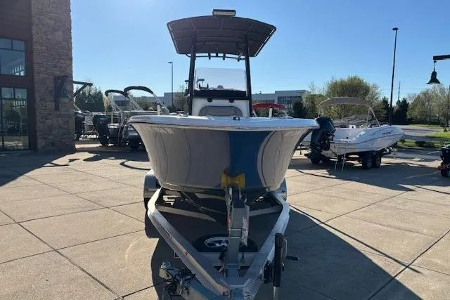 Slide: The Image of 2022 NauticStar 2102 Legacy boat on trailer in outdoor showroom. - 4