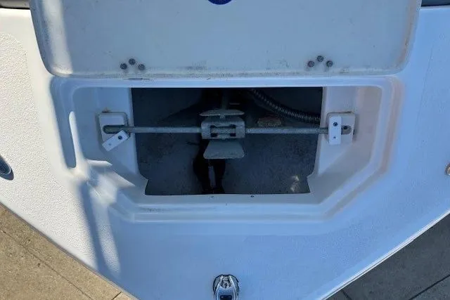 Slide: The Image of Open anchor compartment on a 2022 NauticStar 2102 Legacy boat. - 6