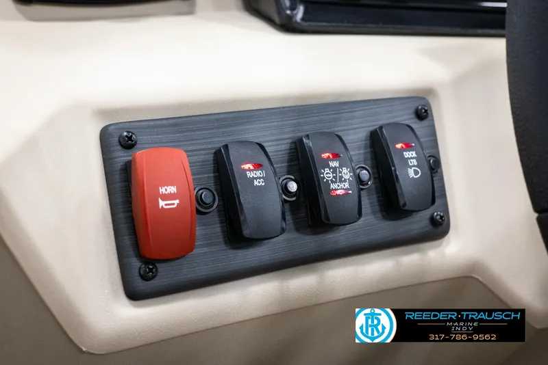 Slide: The Image of Bennington 20 SL 2025 switch panel with horn and light controls. - 27