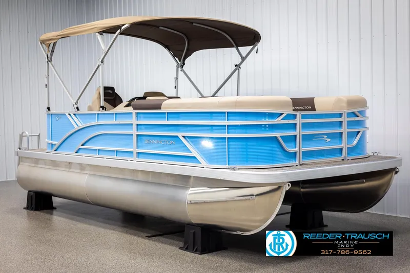 Slide: The Image of 2025 Bennington 20 SL pontoon boat in blue with canopy. - 3