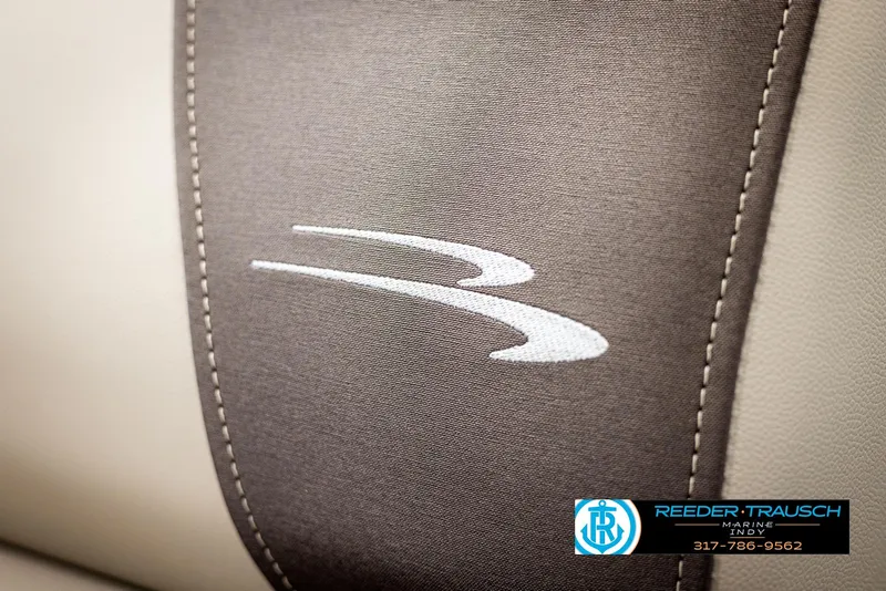 Slide: The Image of Bennington 20 SL 2025 seat detail with logo and stitching. - 37