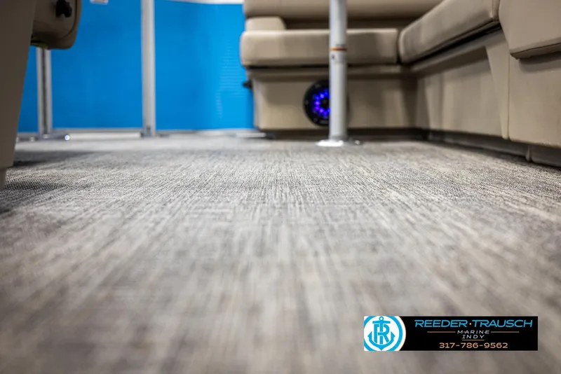 Slide: The Image of Interior of 2025 Bennington 20 SL with carpet flooring. - 39