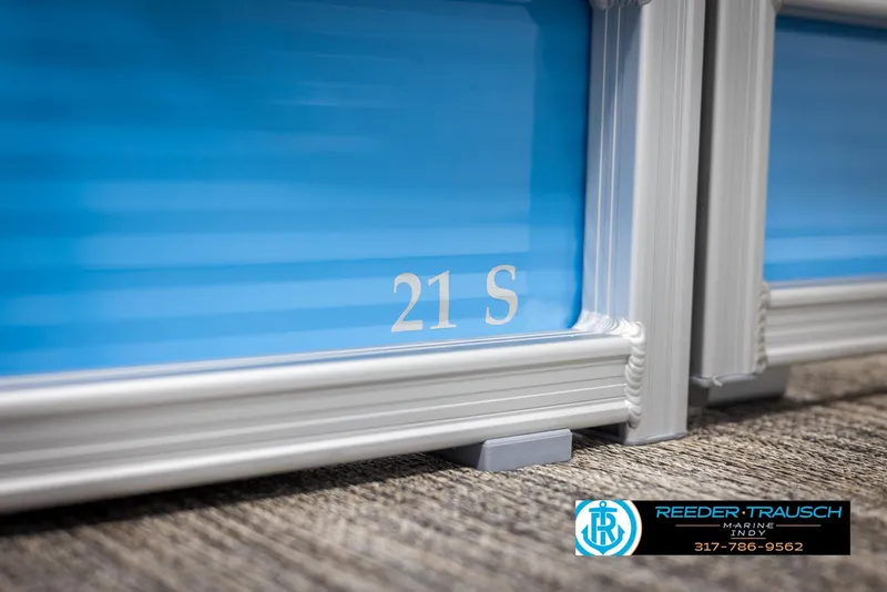 Slide: The Image of Close-up of Bennington 20 SL 2025 with blue paneling. - 42