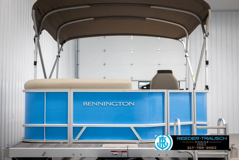 Slide: The Image of Bennington 20 SL 2025 pontoon boat with blue hull and canopy. - 7
