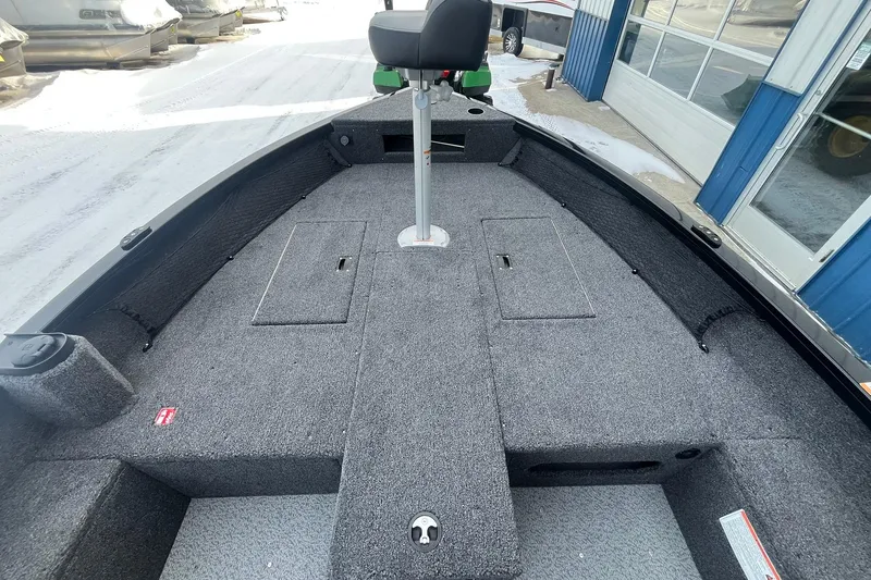 Slide: The Image of Interior view of 2026 Crestliner 1650 Pro Tiller boat deck. - 11