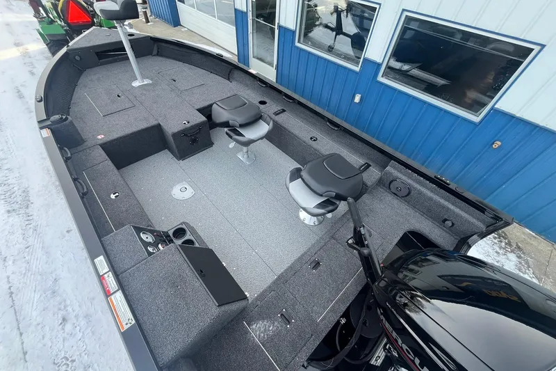 Slide: The Image of 2026 Crestliner 1650 Pro Tiller boat with dual seats and spacious deck. - 8