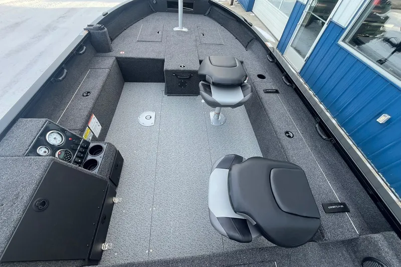 Slide: The Image of 2026 Crestliner 1650 Pro Tiller boat interior with two seats and control panel. - 9