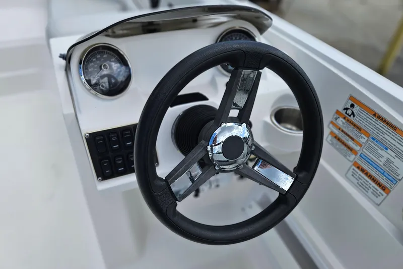 Slide: The Image of Steering wheel and dashboard of 2023 Hurricane SunDeck Sport 188 OB boat. - 11