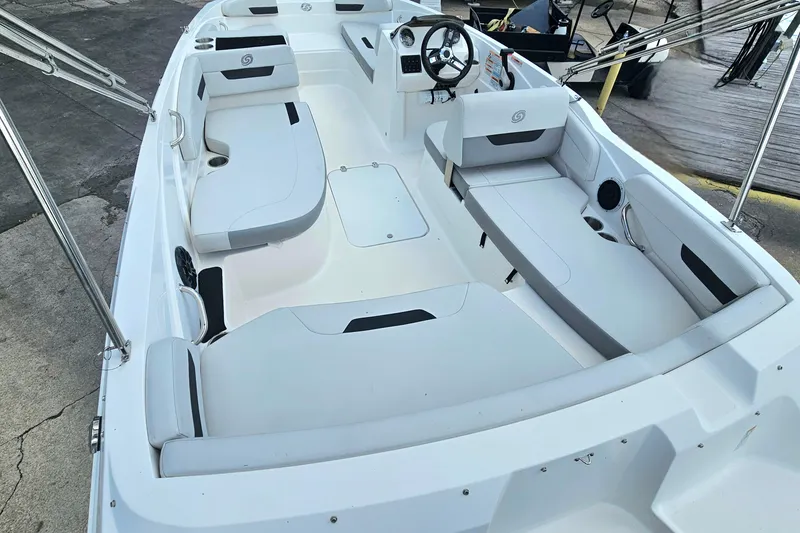 Slide: The Image of 2023 Hurricane SunDeck Sport 188 OB boat interior with spacious seating and modern design. - 6