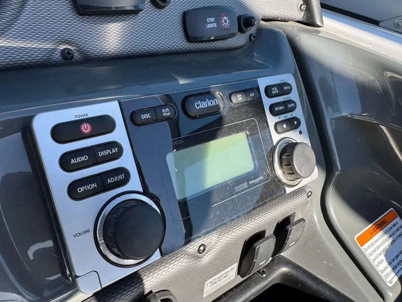 Slide: The Image of Yamaha SX210 2014 boat console with Clarion audio system. - 16